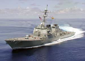 Portside view of the USS Cole at speed