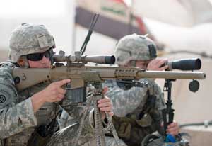 Right side view of the M110 SASS sniper rifle with tripod and scope